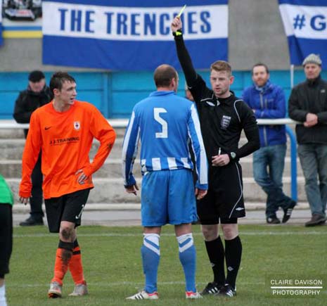 The game began to get bad tempered with referee James Bateman booking five players in the last ten minutes of the half - and baffling both sides with some of his decisions.