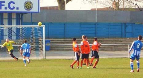 Josh Scully took the resultant free kick from which Joe Flint narrowly missed the target with a flicked header.