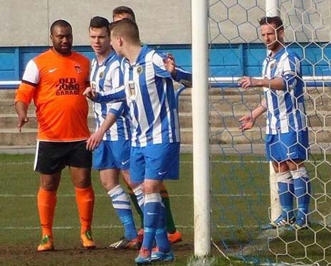 Man of the Match, captain Jamie Smith (right), marshalls his defence