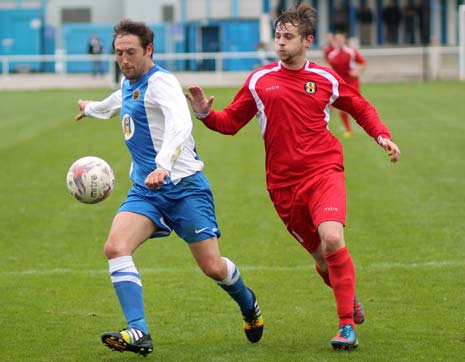 Staveley's Man of the Match, debutant Damian Magee (left), battles Parramore's Lee Whittington