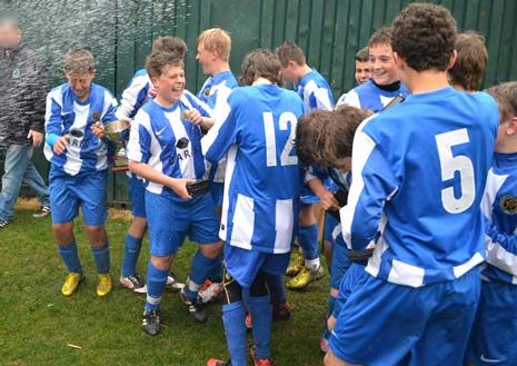 The lads get the 'champagne' treatment from coaches and parents