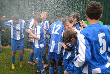 The lads get the 'champagne' treatment good and proper!