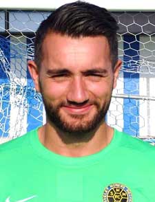 From the dead ball kick, Steve Hernandez had to palm the ball out from under his crossbar.